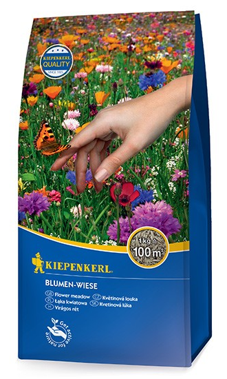 Produktbild von Kiepenkerl Blumenwiese Samen in einer Verpackung mit Abbildung einer Hand die Samen aussät und einer blühenden Wiese im Hintergrund.